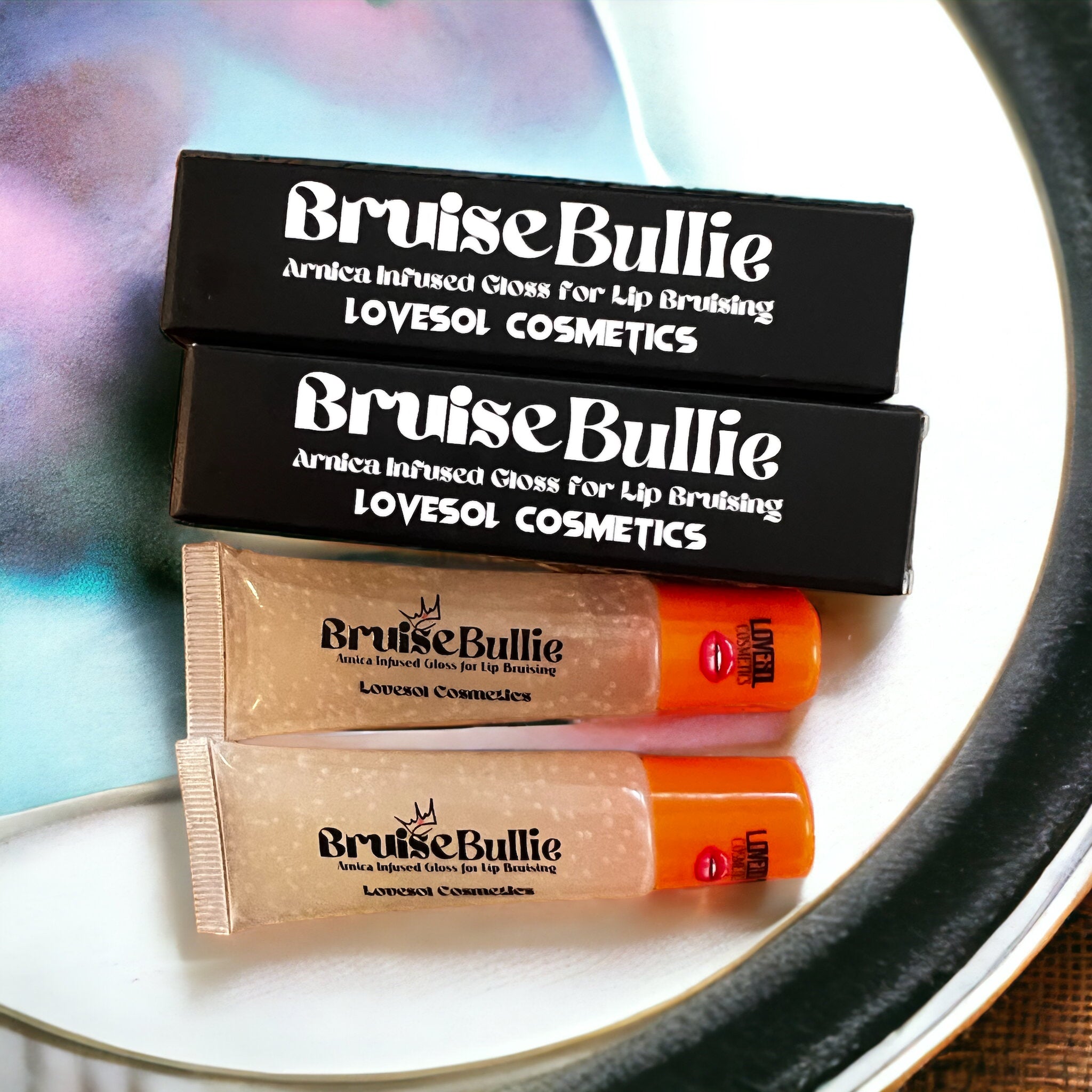 2 Pack Of Bruise Bullie- Arnica infused lip gloss – Lovesol Cosmetics